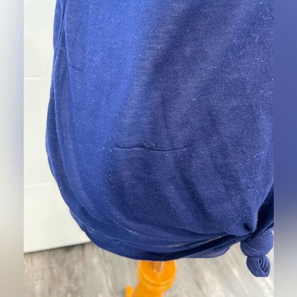 Blue v neck, slightly sheer, knot in front, small run in fabric. - Picture 2 of 6